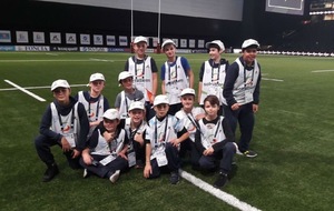 Les U12 ramasseurs de balles pour la première du Racing à l'U Arena